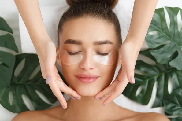 Woman with ToGoSpa eye mask on with eyes closed